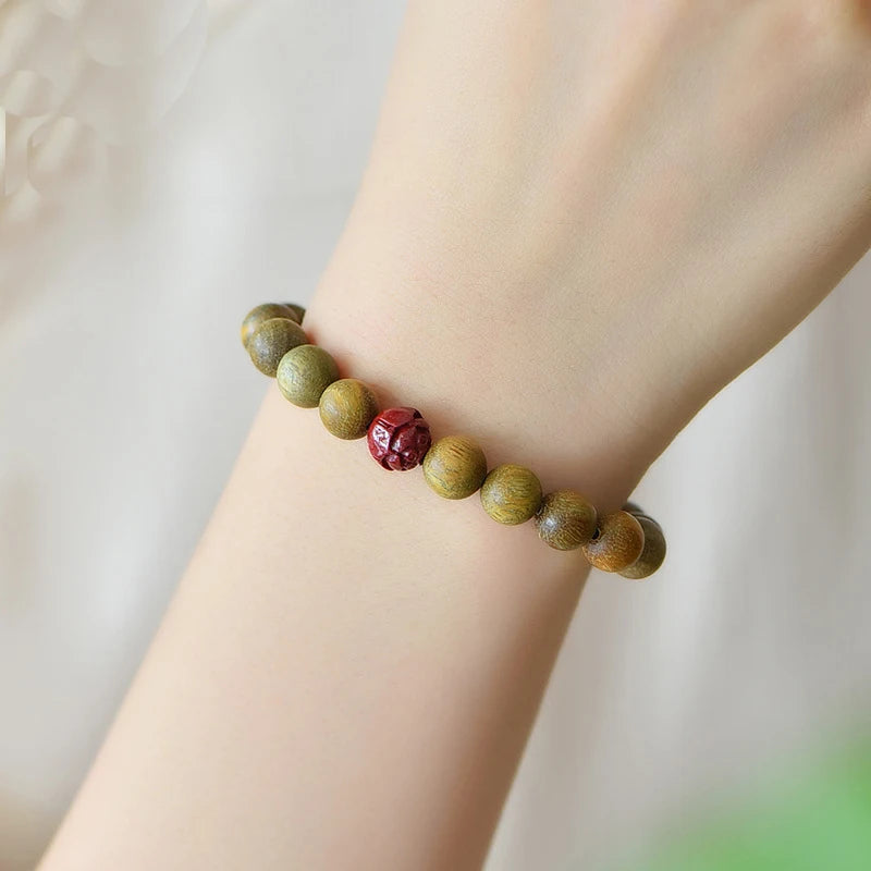 Green Sandalwood Beaded Bracelet with Cinnabar Lotus Bead