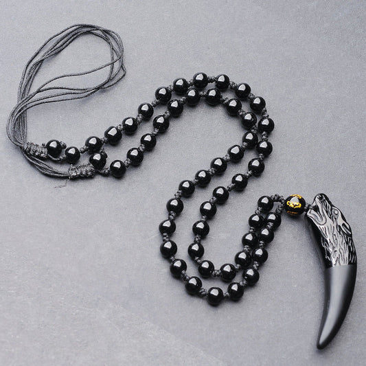 Black Obsidian Wolf Fang Pendant Necklace for Strength & Healing - Mystara.shop