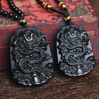 Carved Obsidian Dragon Pendant With Four Pieces