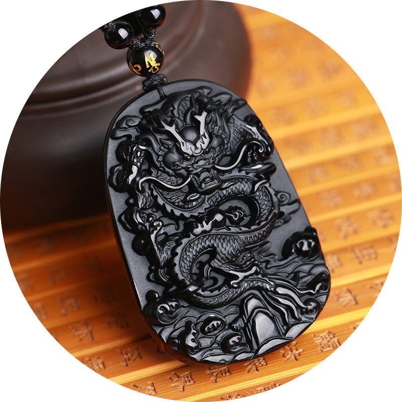 Carved Obsidian Dragon Pendant With Four Pieces