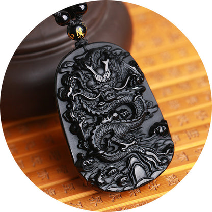Carved Obsidian Dragon Pendant With Four Pieces