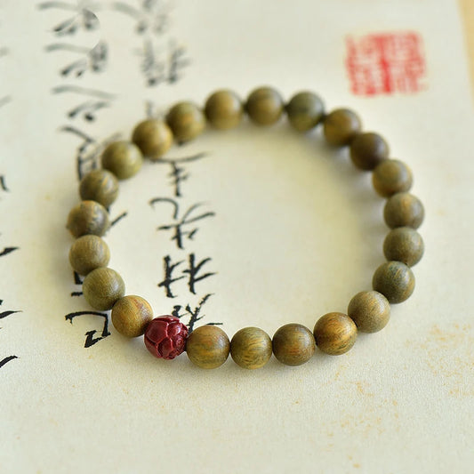 Green Sandalwood Beaded Bracelet with Cinnabar Lotus Bead